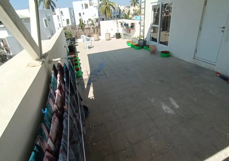 A neglected terrace before landscaping