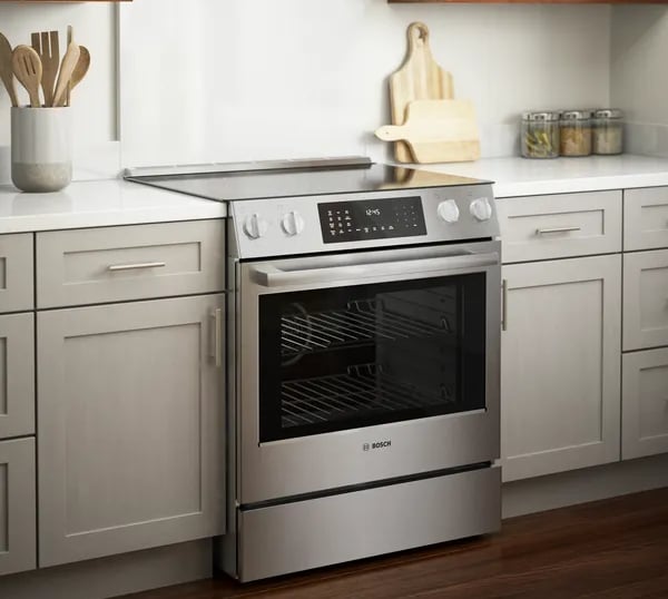 Kitch with kitchen cabinet and a Bosch stove