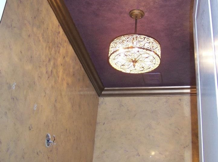 Venetian Plaster Powder room with Metallic trim by Marcine in Bernardsville, NJ