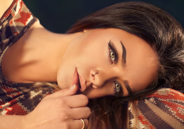 woman with light eyes and brown eyebrows