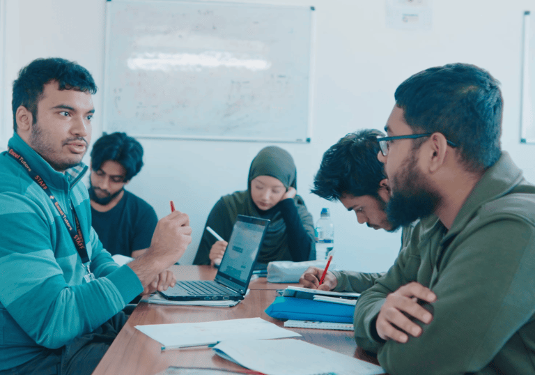 Experienced Excel tutor providing expert tuition support to students in a classroom setting.
