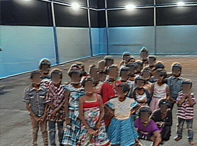 a group of children in a room on green Way Association