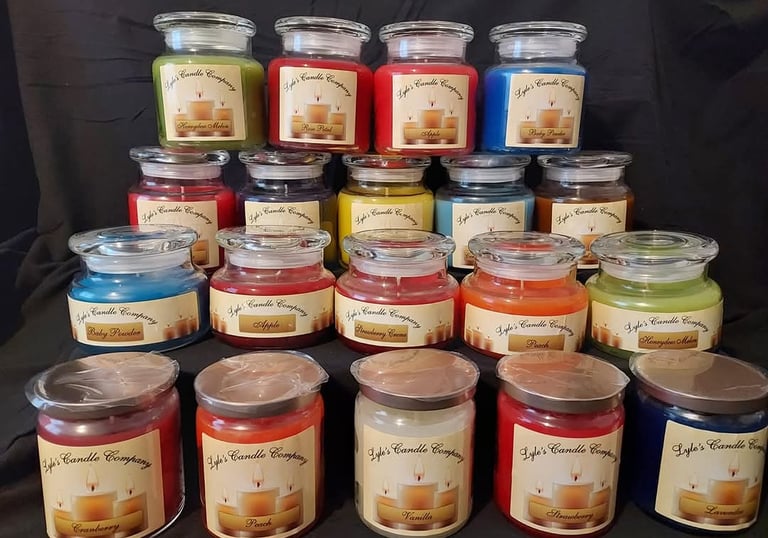 a bunch of candles that are sitting on a table
