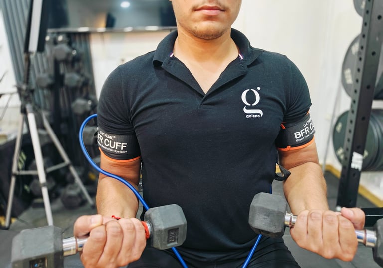 patient at Galena Physiotherapy in Noida wearing BFR (Blood Flow Restriction) cuffs for BFR Training