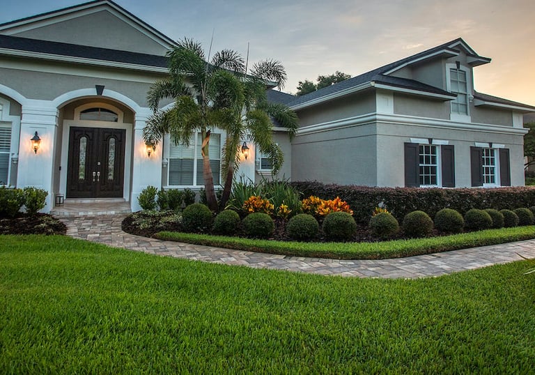 a house with a nice front yard and landscaping