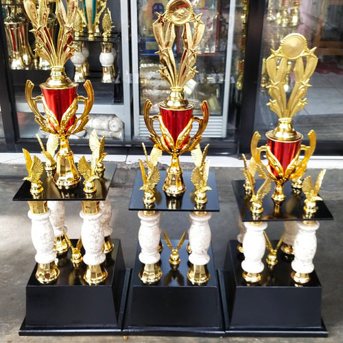 a group of trophies trophies with trophies on display