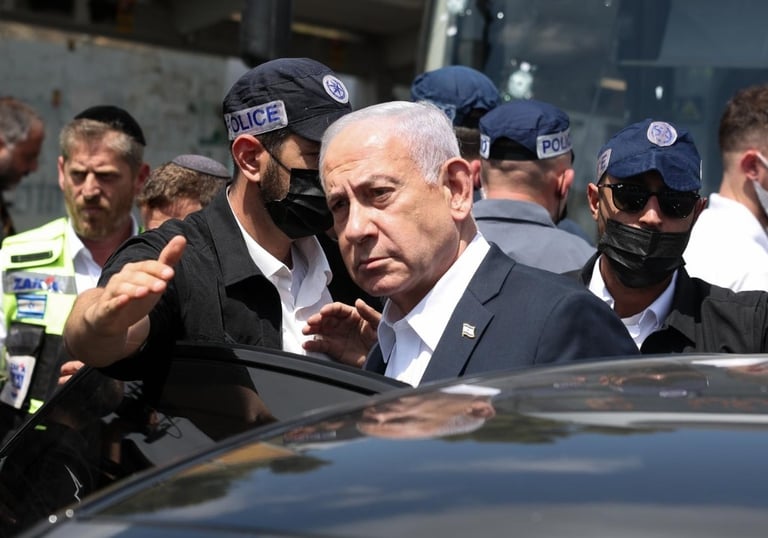 a man in a suit and a mask on a car