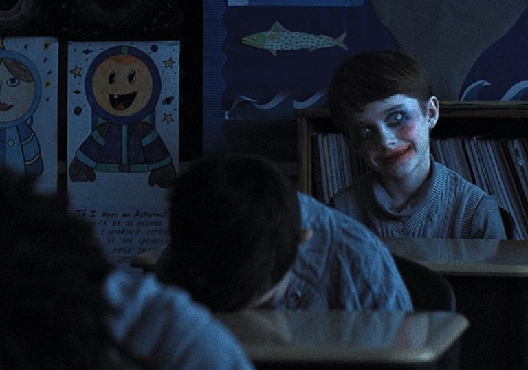 a person with a creepy face and a creepy face