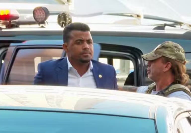 a man in a suit and a woman in a suit