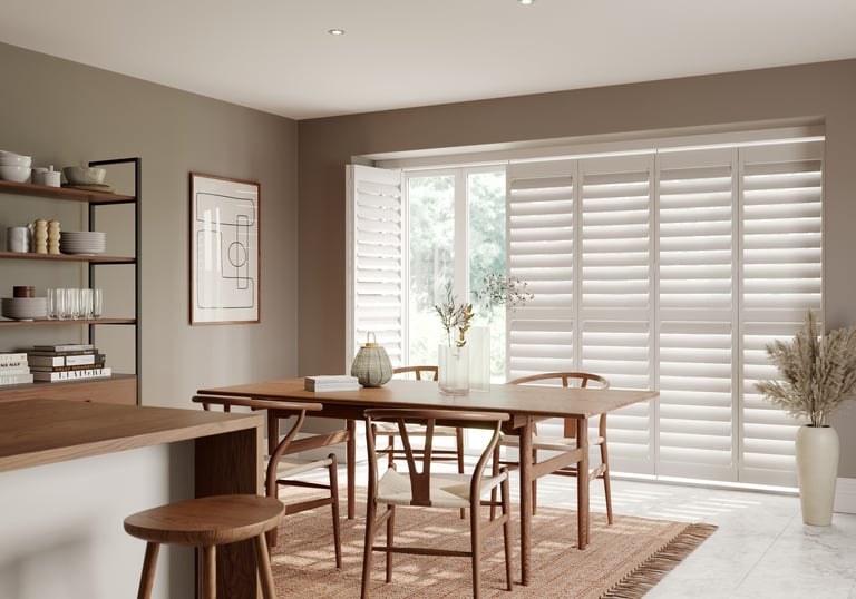 tracked plantation shutters covering a telford door
