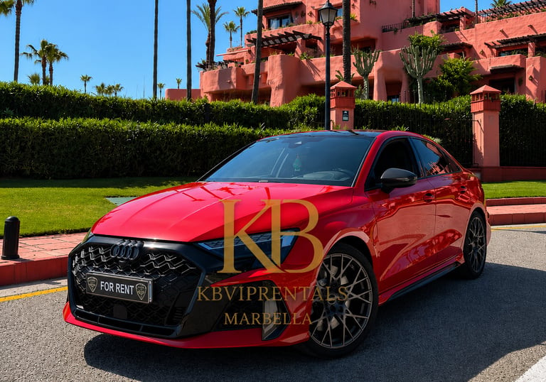 Red Audi RS3 luxury car rental parked in front of a Mediterranean villa in Marbella.