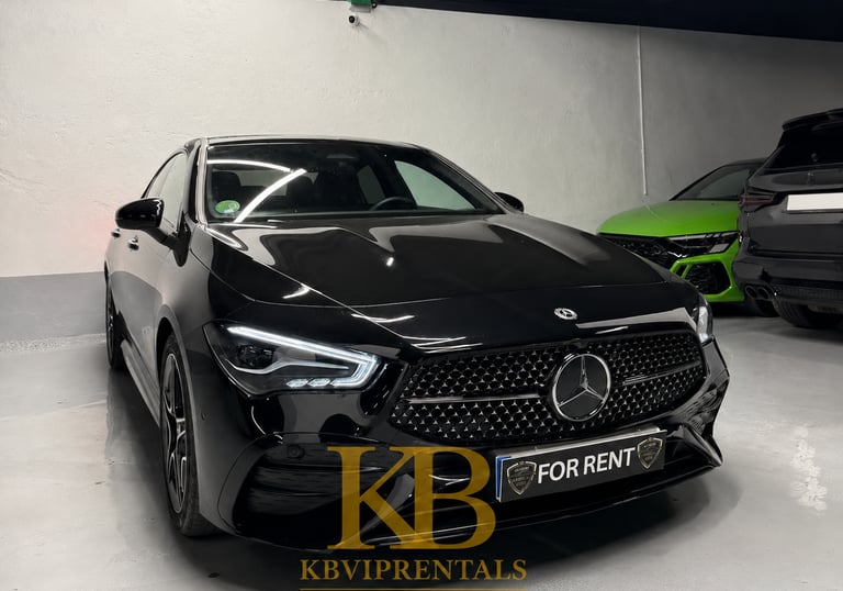 Black Mercedes CLA luxury car for rent in Marbella showroom with LED headlights and KB VIP Rentals branding.