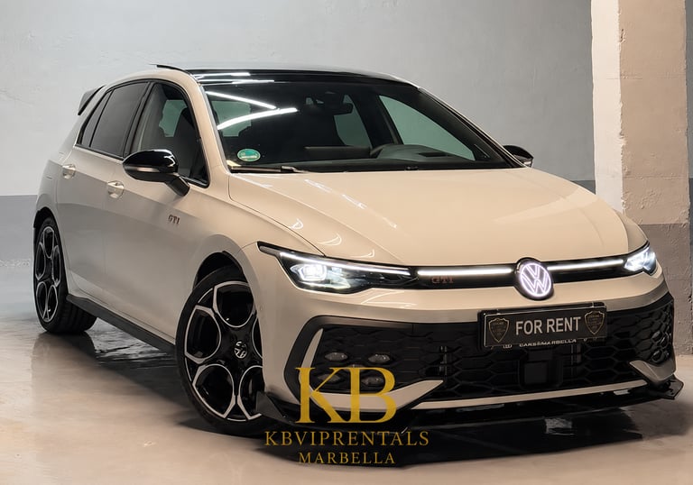 White Volkswagen Golf GTI hatchback for rent in Marbella with LED headlights and black alloy wheels.