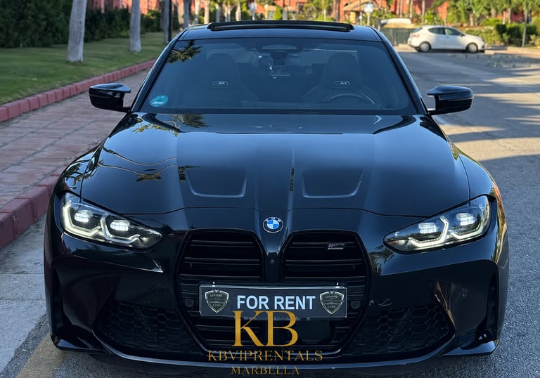 Front view of a sleek black BMW M4 Competition for rent in Marbella, showcasing its luxurious design and powerful presence