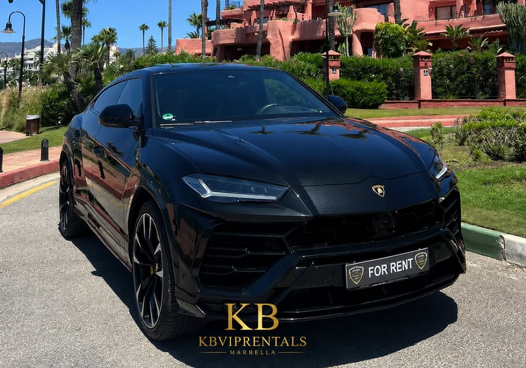 Black Lamborghini Urus luxury SUV for rent in Marbella parked near a tropical resort.