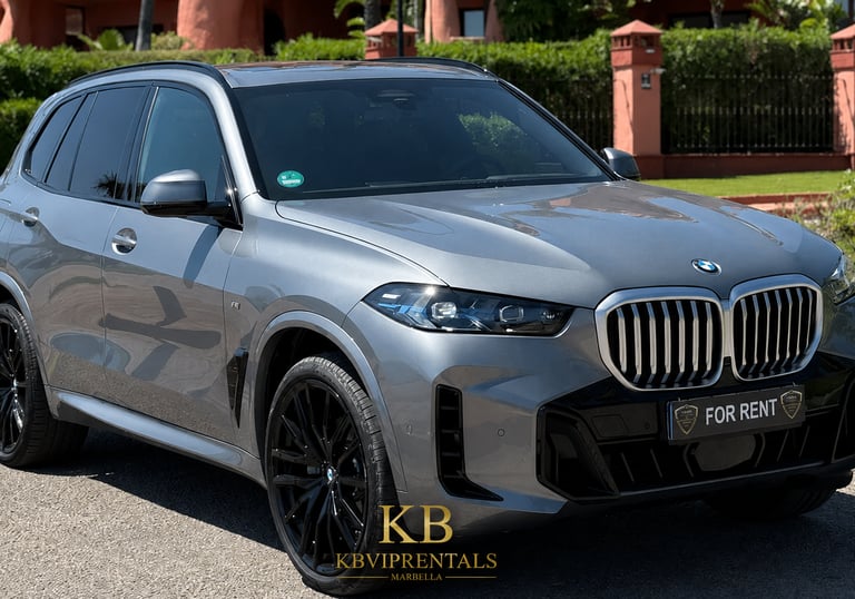 Luxury silver BMW X5 SUV for rent in Marbella with black alloy wheels and a sleek modern design.