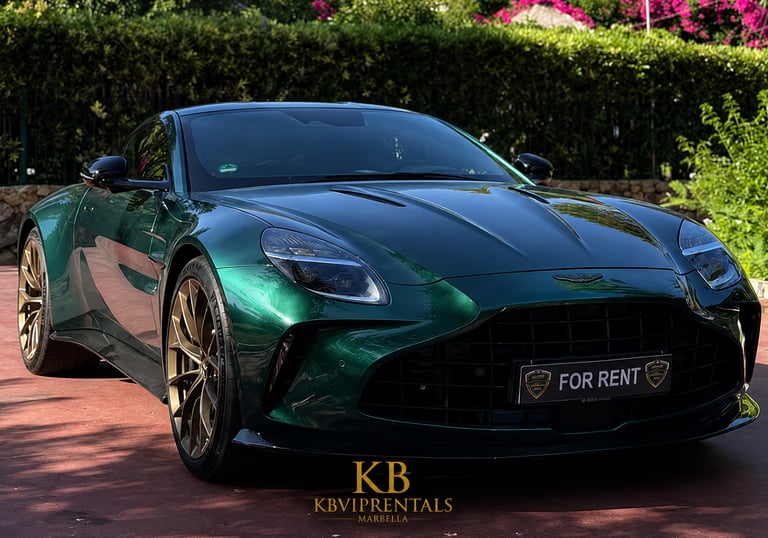 A luxury green Aston Martin Vantage for rent with gold rims parked outdoors in Marbella.