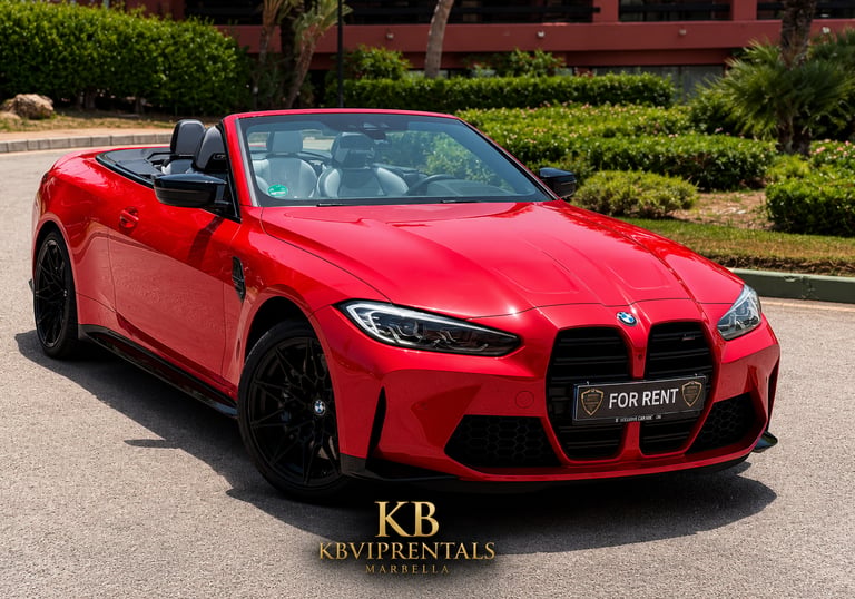 Red BMW M4 convertible for rent in Marbella with black wheels and luxury white leather interior.