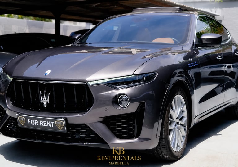 Luxury grey Maserati Levante SUV for rent in Marbella featuring a sleek front grille and premium design.