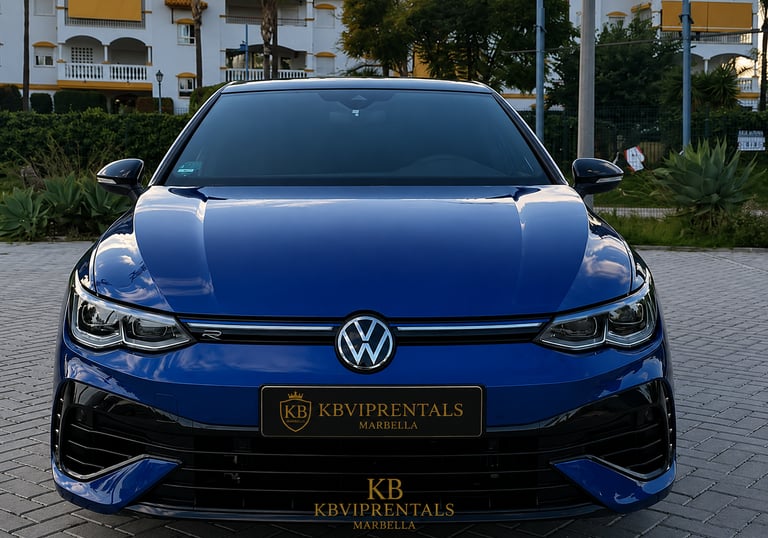 Front view of a blue Volkswagen Golf R parked in Marbella, featuring a luxury rental car logo.