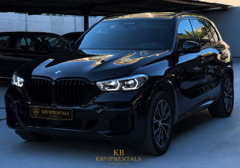Luxury black BMW X5 SUV parked at KB VIP Rentals Marbella for premium car hire services.
