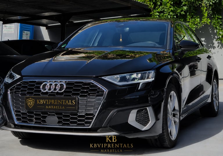 Sleek black Audi rental car parked in Marbella with luxury KBVIPRENTALS branding.