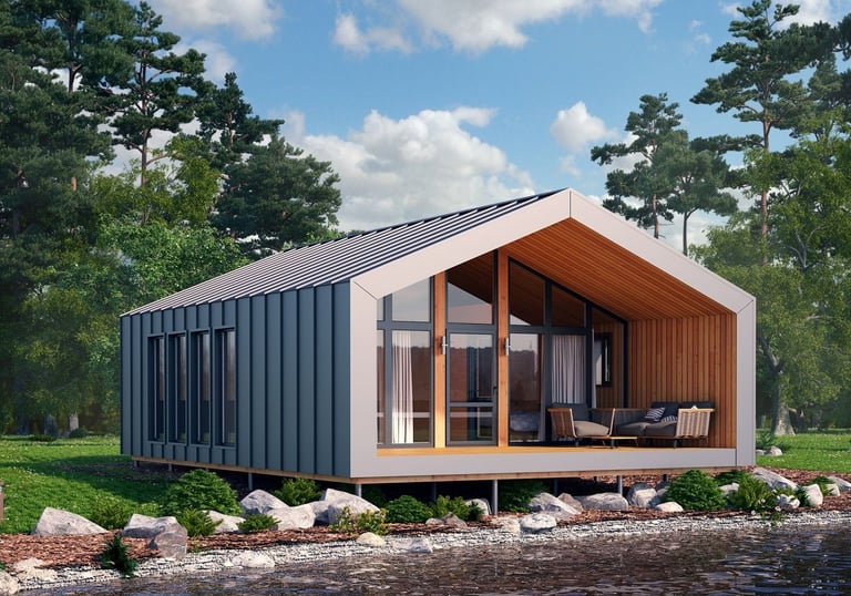 Modern prefab cabin with a metal roof and glass walls situated on a serene lakefront.