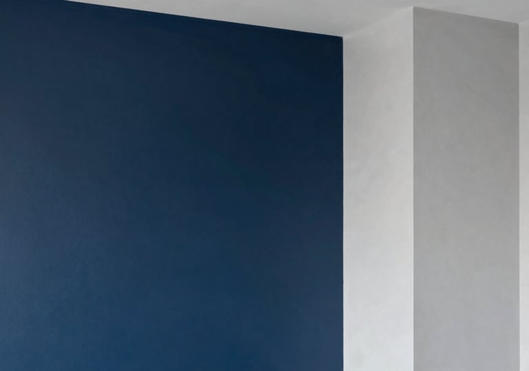 Modern interior space with professional painting finishes, featuring a dark blue accent wall and clean grey transitions, North American architectural style, sharp and clean lines.