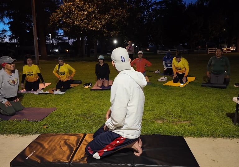 Coach Ray Z teaching a barefoot training, mobility and recovery class after Los Angeles marathon for