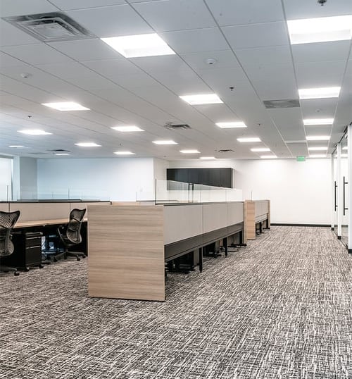 Bright modern office with energy-efficient LED panel lights Victoria BC