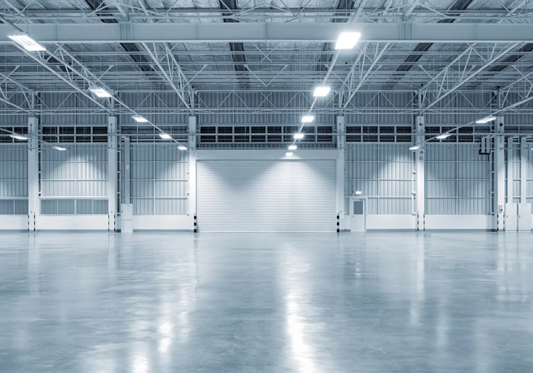 Spacious commercial warehouse interior with durable high-bay LED fixtures