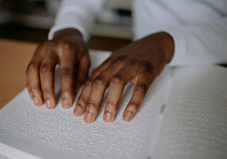 a person's hands on a book