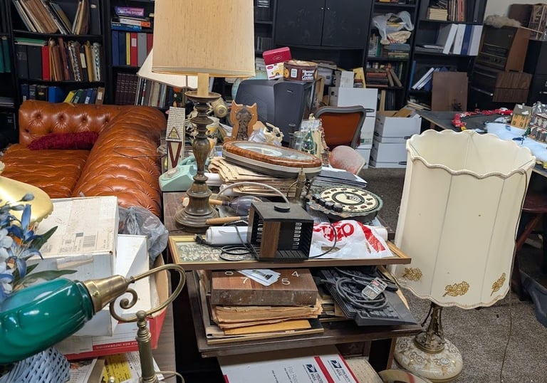 over filled room with miscellaneous items