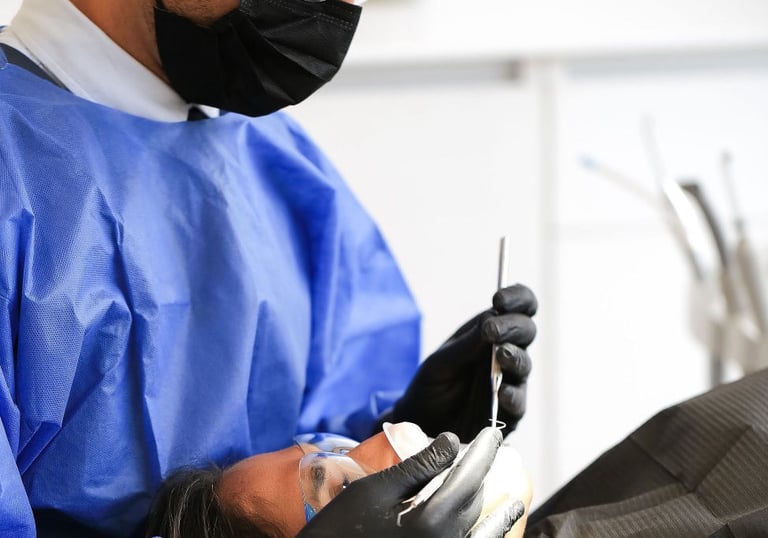 a man in a blue scrub suit and a woman in a blue scrub suit