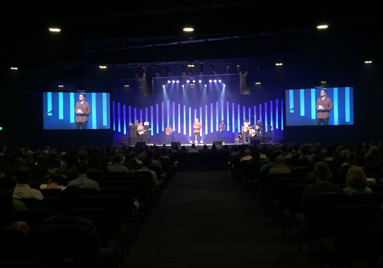 Stage with singers and lights in a church