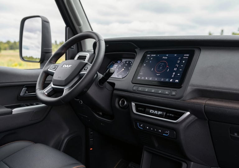 The interior cabin of a modern DAF xf 480, showcasing cutting-edge technology and minimalist controls, soft natural light, Central European / Polish setting.