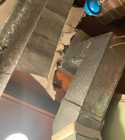 Furnace ducting with asbestos insulation