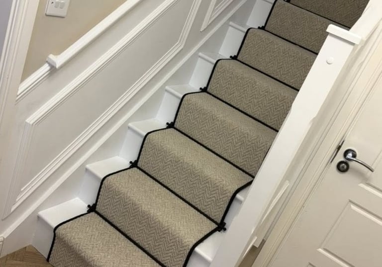 Blackpool carpet fitted on white wooden stairs