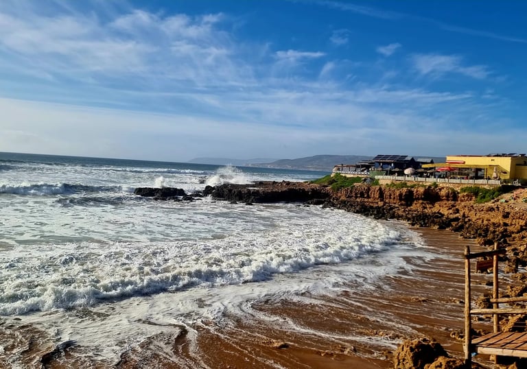 Group surf coaching session at Anchor Point, Morocco