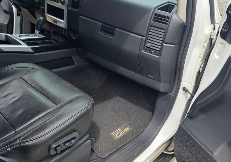 Interior automotive detailing cleaning vehicle carpets and upholstery