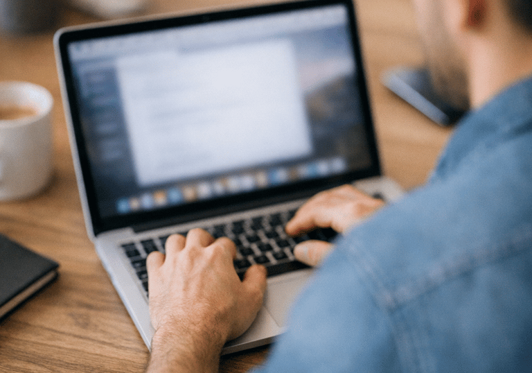 Maintaining code on a laptop.