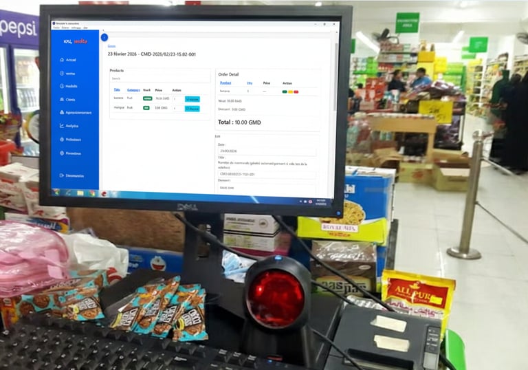 Point of sale system showing inventory software on a monitor at a retail grocery store checkout counter.