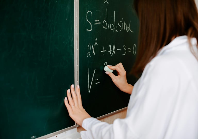 A Level Mathematics online tutoring shown by A level Maths written on a board 