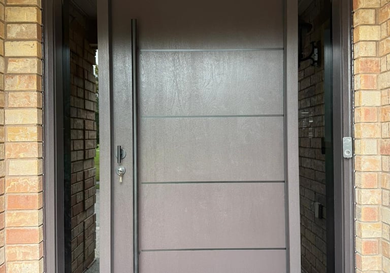 Custom fiberglass exterior door installation by City Home Improvements in Mississauga, Ontario