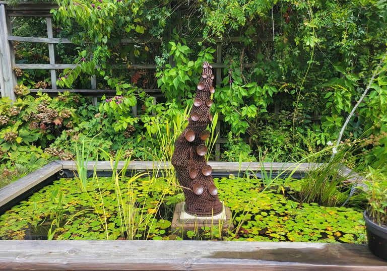 Bike chain tentacle "Seas the Day" being shown at the NCBG in Chapel Hill, NC
