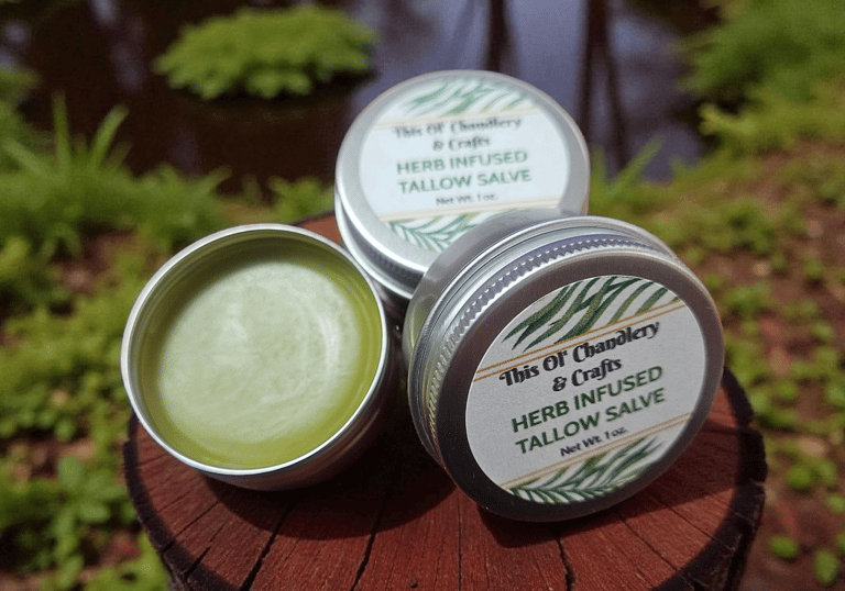 Herb infused tallow salve in tin jar, natural handmade skin balm made with grass fed tallow
