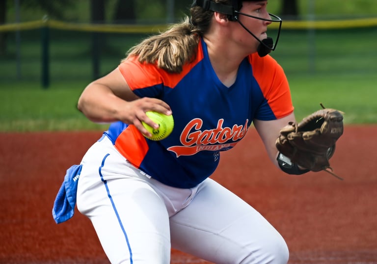 SOFTBALL PITCHER TURNING TO THROW TO FIRST