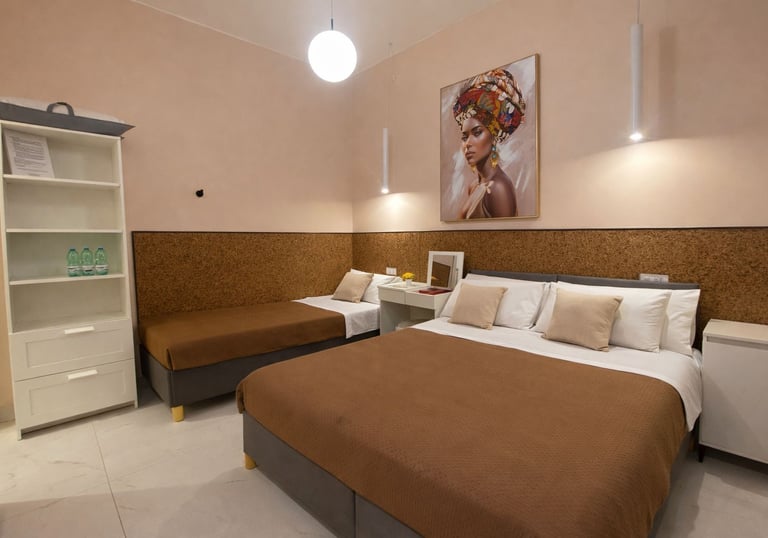 camera tripla comfort ciro marina letto queen e letto singolo il vicoletto bnb