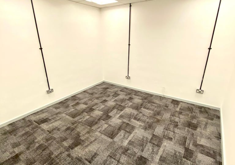 carpeted office room for rental at DBC