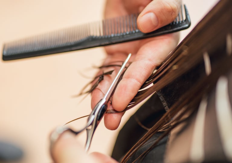Hair cutting service at Just Teasin salon